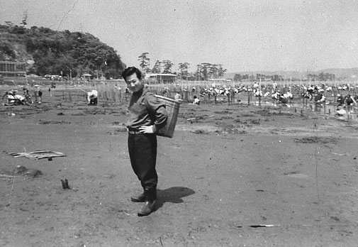 My father, clam digging