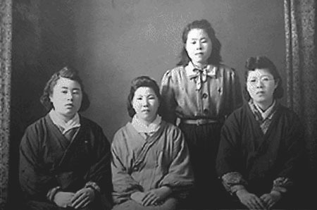 Mrs. Tanaka (far left) age 21