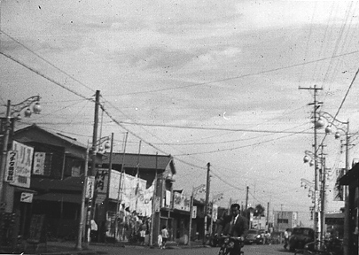 Looking down street in the early '60s, with kimono shop