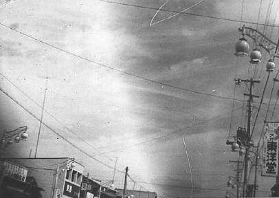 Nice view of clouds, ornate street lamps.